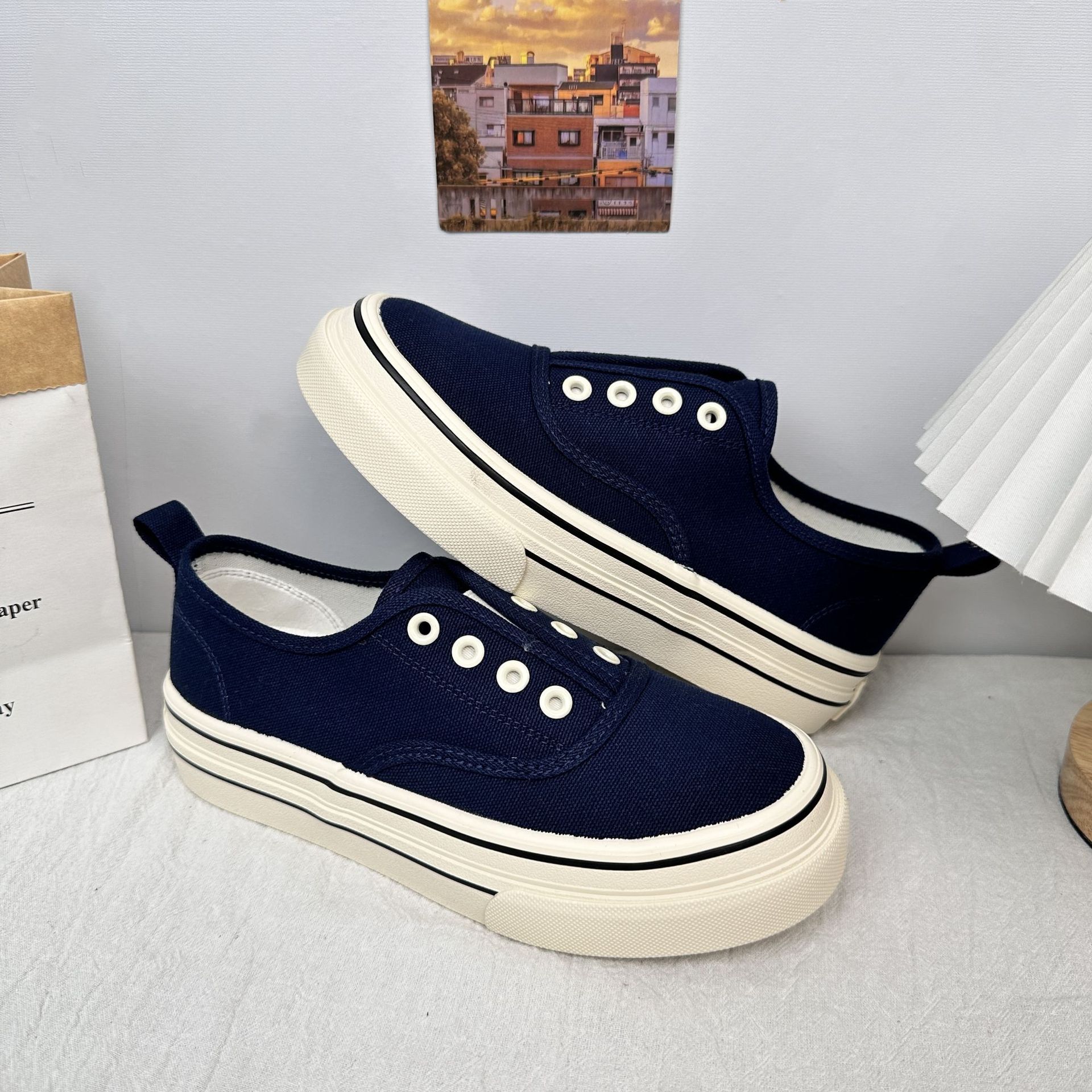 6650 zapatos de lona de color sólido de estilo simple 2025 verano nuevo estilo de un pie zapatos casuales de suela gruesa de corte bajo