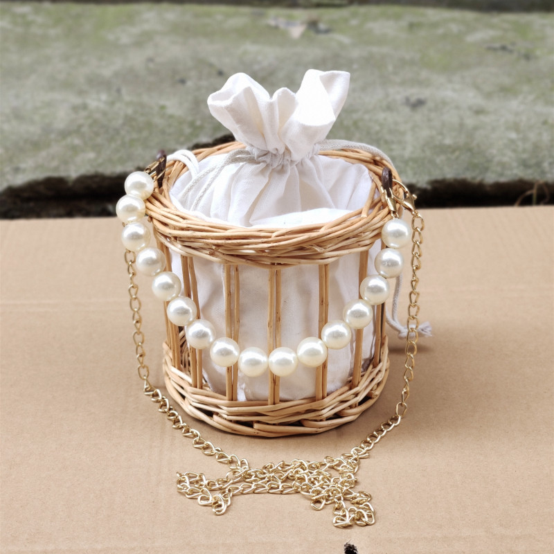 Bolso de paja de verano para mujer 2021 Nuevo bolso de celebridad de Internet bolso de perlas bolsa de ratán de regalo de mano bolsa de cubo de playa