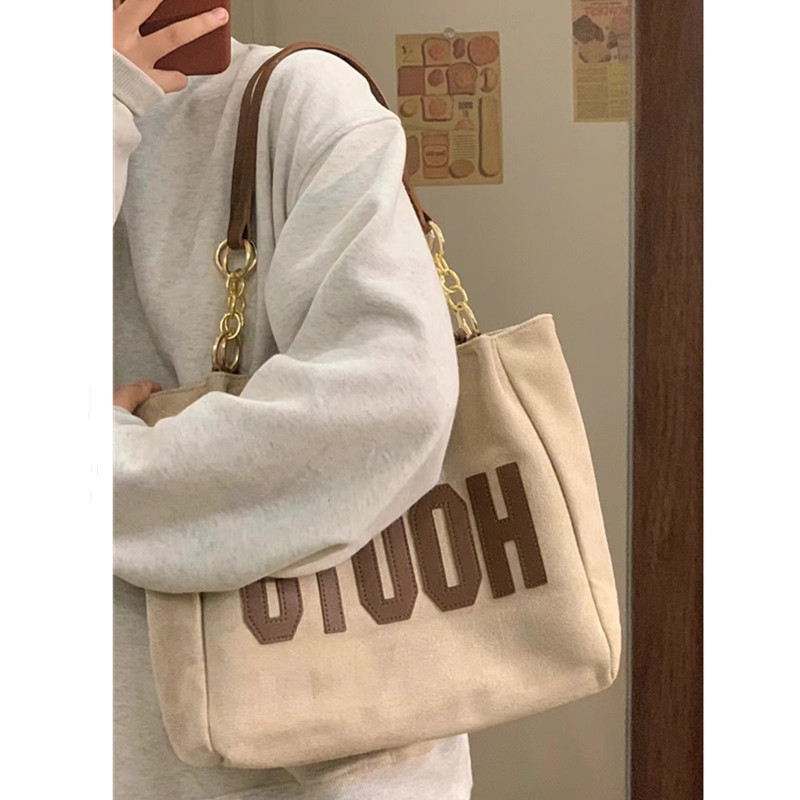 Best-selling women's bags, large-capacity bags, 2023 new Korean style popular letter college student class shoulder bags, tote bags full figure