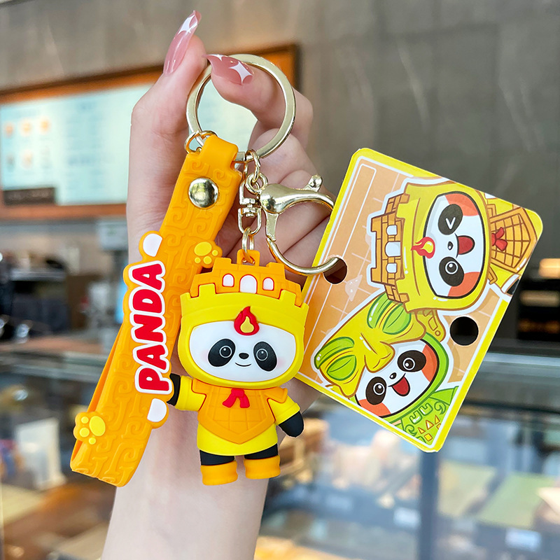 Muñeca de goma goteando bolsas escolares colgantes colgantes de muñecas colgantes de la máquina del mercado nocturno regalos al por mayor llaveros de dibujos animados