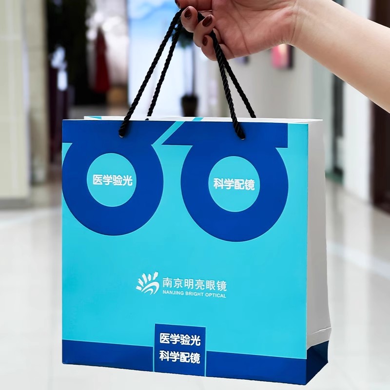 眼镜店手提袋纸袋印刷视光开业礼品袋包装袋印刷logo烫金袋子印刷