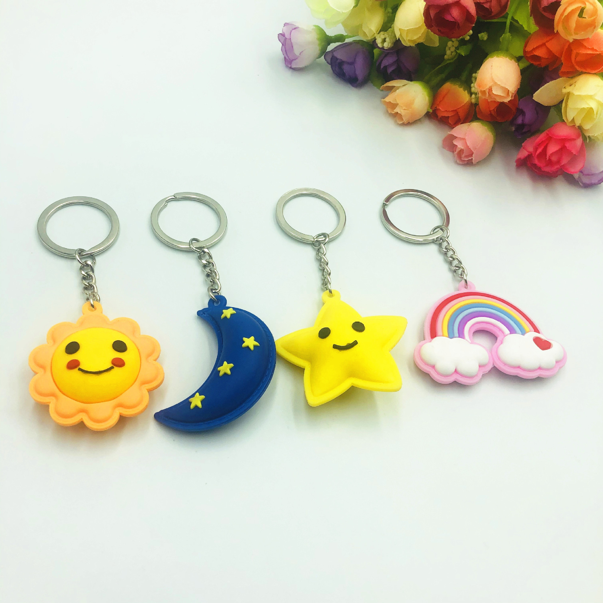 Transfronteriza PVC de goma suave cara sonriente Sun Star Moon llavero colgante bolsa de adornos pequeños niños de regalo de Iluminación