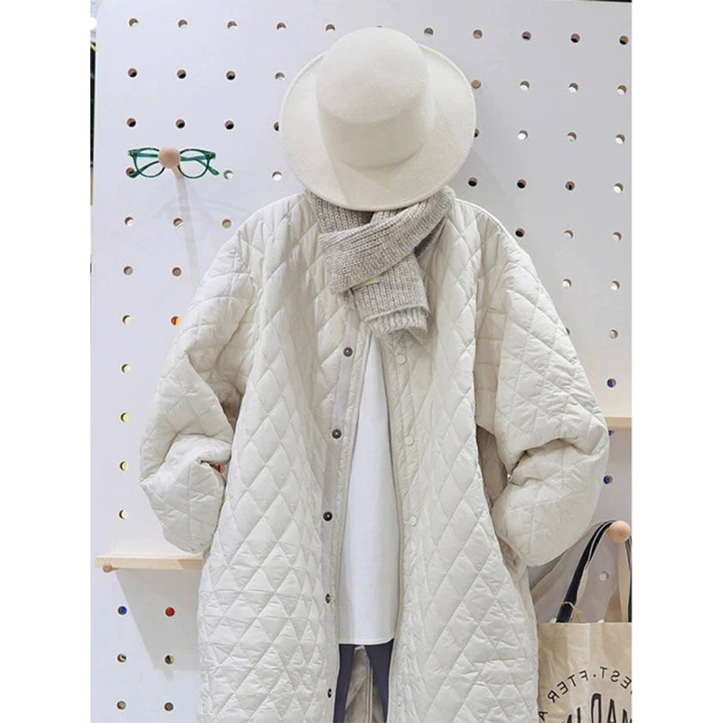 White light and thin quilted demi-season long down jacket with down, increased thickness, oversize