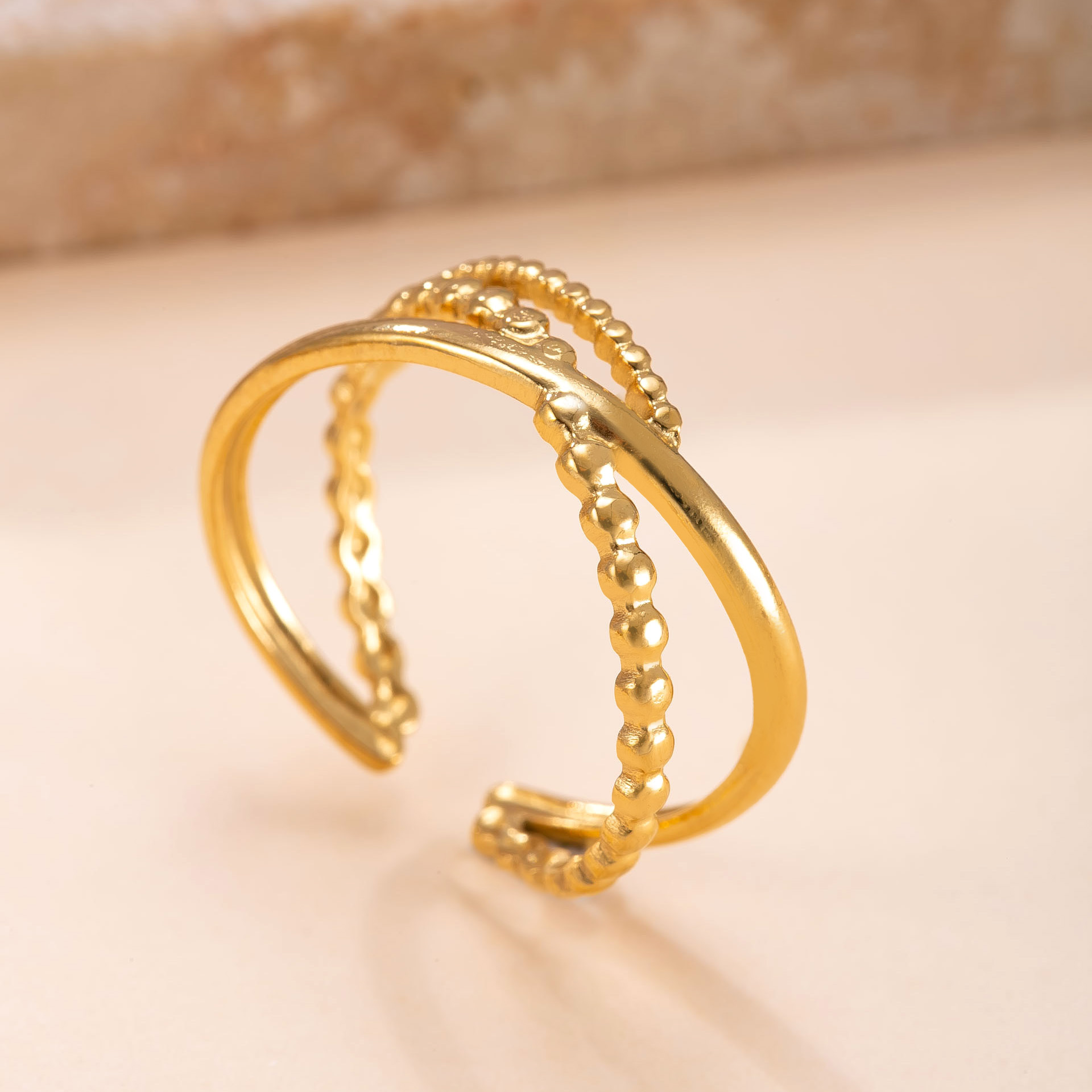 Anillo de acero inoxidable europeo y americano Moda femenina Anillo de estrella de mar hidráulico geométrico Chapado en oro de 18 quilates Anillo de amor Joyas de acero de titanio
