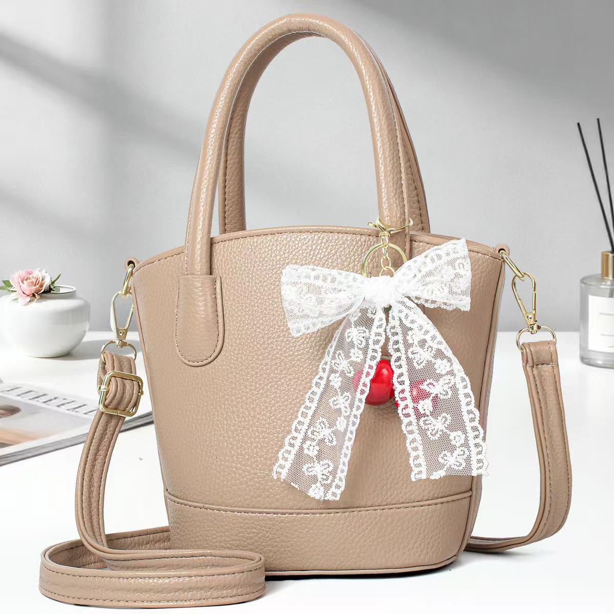 Cestas de verduras casuales simples bolsos de mano bolsas de cubo de viaje de moda colgante universal bolsas de hombro transfronterizas
