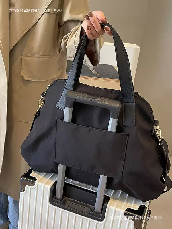 Handheld capacious travel bag, shoulder bag, suitcase