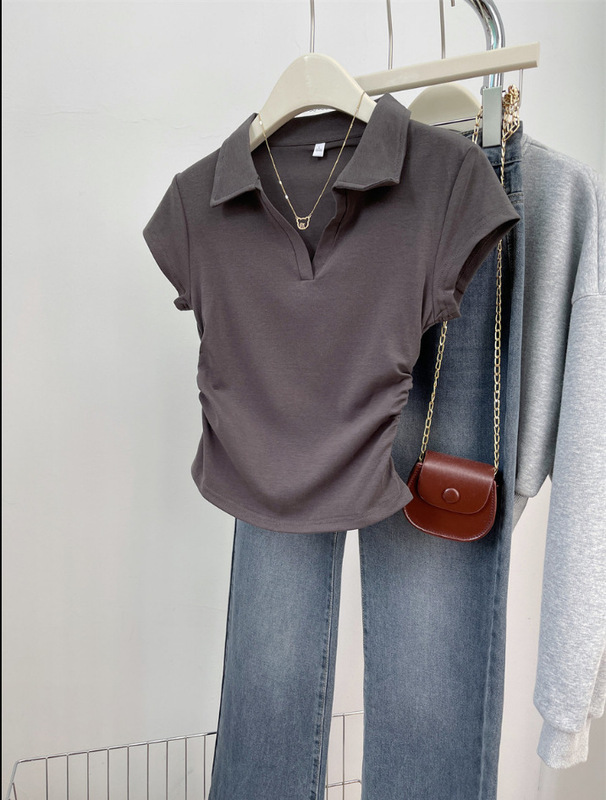 ギャルは腰のtシャツの半袖の女性の純欲の夏の2025新型の純色の女性の丸首の底のシャツの卸売りを収めます。|undefined