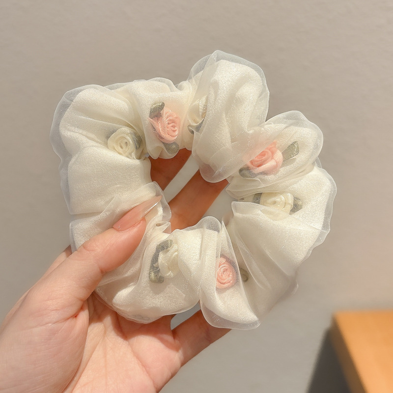 Pastoral viento intestino anillo de cabello mujer 2025 nuevo estilo de alta sensación bola de cabello cuerda de cabeza flor dulce princesa adornos de cabello cuerda