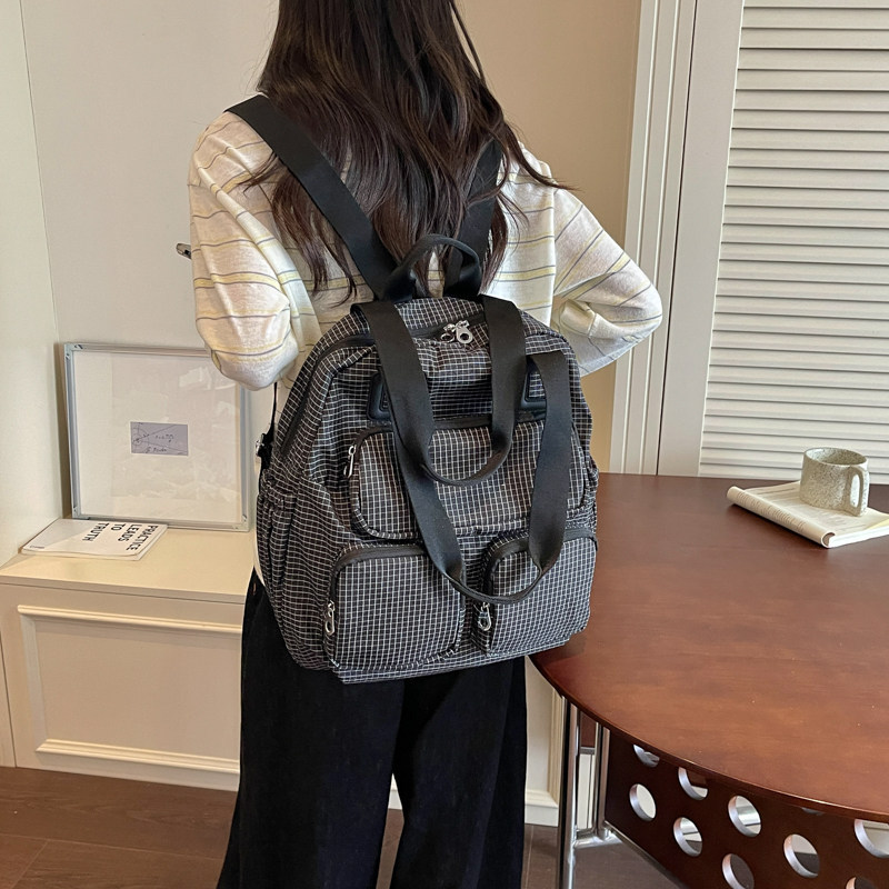 2026 nueva mochila de gran capacidad de viaje mochila de moda coreana multifuncional empalme día de nylon color contrastante