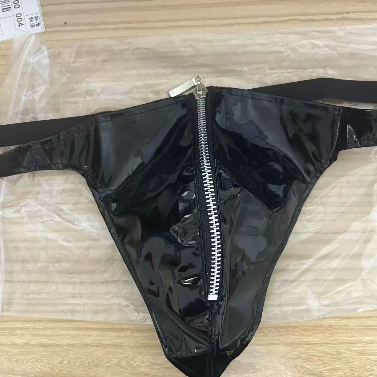 Мужские трусы-стринги из блестящей искусственной кожи с ПВХ-зеркалом, сексуальные, на молнии, открытые.