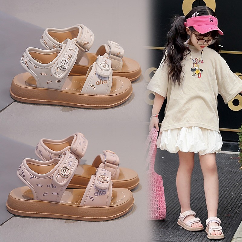 Niños zapatos de playa de dedo abierto verano 2026 nuevo estilo de moda para niñas zapatos casuales letras huecos zapatos princesa