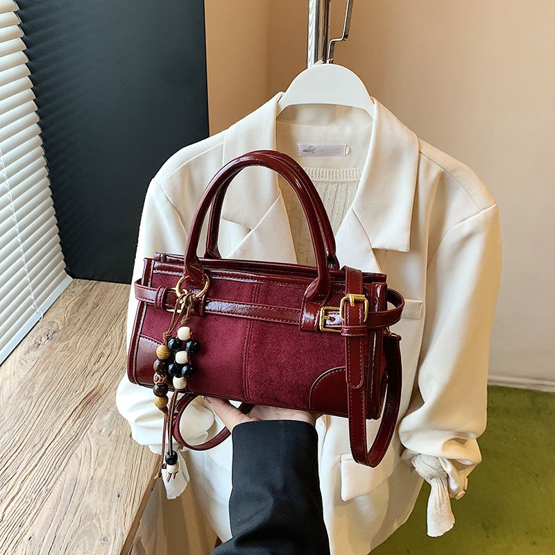 Transfronterizos otoño invierno retro esmeriado empalme bolso de mano mujer 2025 nueva moda color contraste bolso de hombro