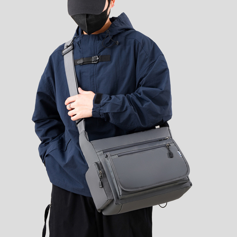 Bolso bandolera de negocios para hombres Tela Oxford anti-salpicaduras Viajes de ocio Bolso bandolera de almacenamiento multifuncional de gran capacidad al por mayor