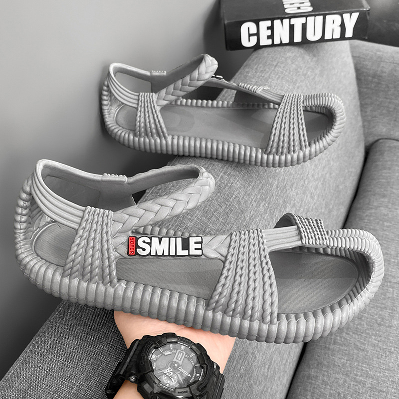 Verano nuevo estilo pareja retro ratán de goma sandalias de playa transpirables hombres y mujeres zapatos casuales antideslizantes a mano