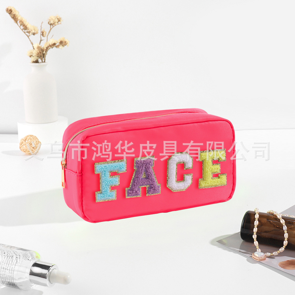 Transfronterizo amazon popular toalla bordada carta de nylon bolsa de cosméticos bolsa de almacenamiento de gran capacidad informal de las mujeres a prueba de agua