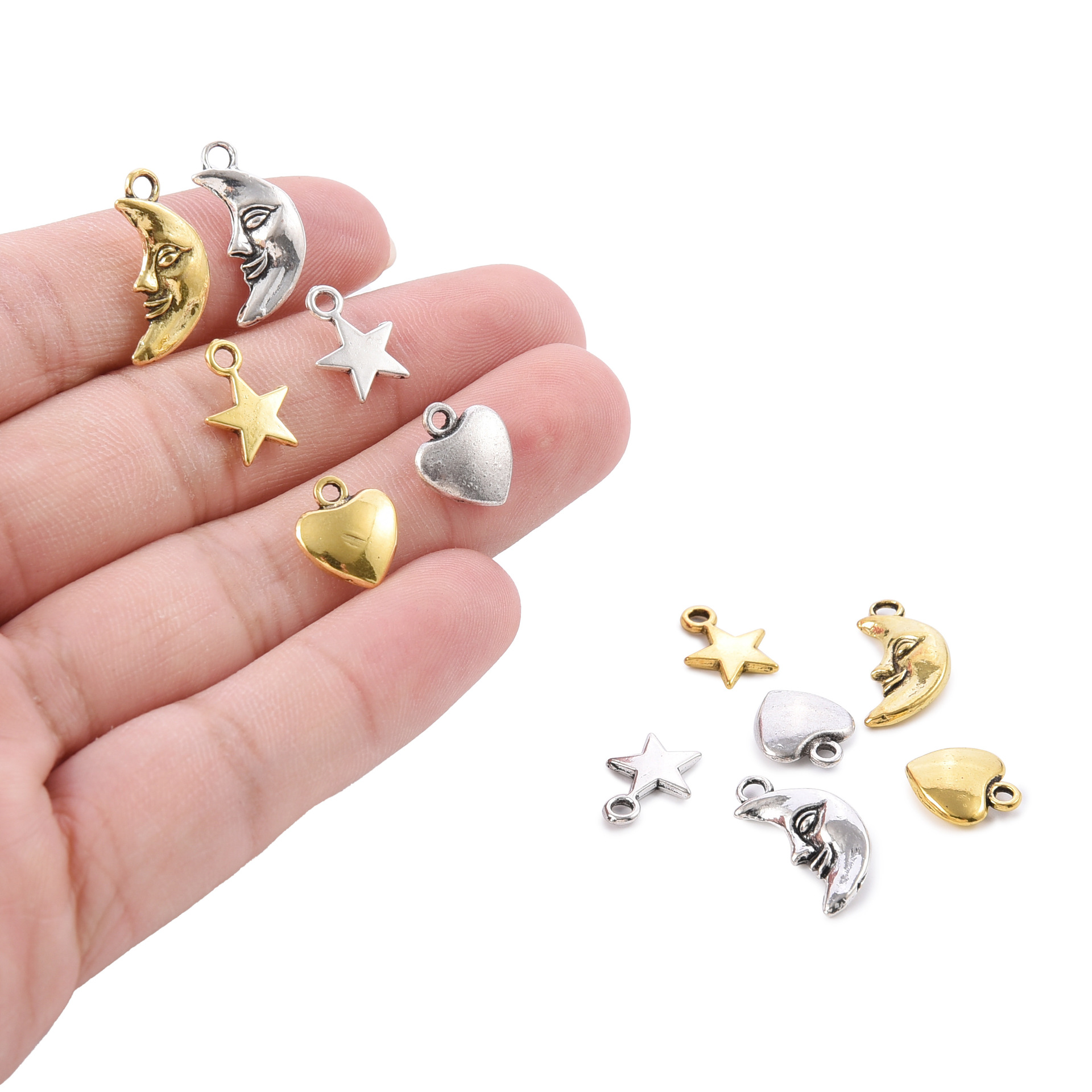 Accesorios de joyería de bricolaje modelos mixtos retro estrella luna aleación colgante joyería material hecho a mano amor colgante de cara sonriente