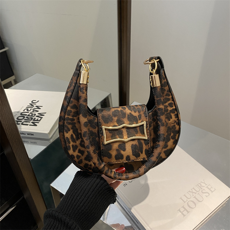 Moda impresión de leopardo bolso de brazo 2024 nuevo nicho de diseño bolso de mano personalidad de moda moda bolso de hombro de mujer