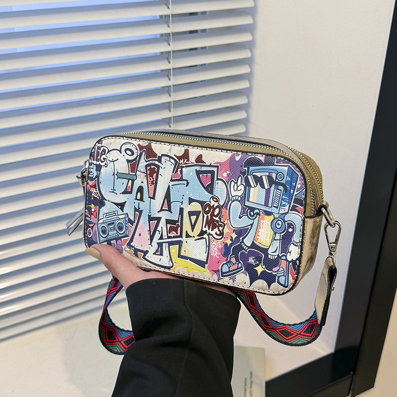 Bolso cuadrado pequeño estilo explosivo transfronterizo, graffiti de personalidad femenina, bolso puenting, bolso de cámara con correa de hombro ancha de moda, bolso de mensajero de hombro de todo fósforo