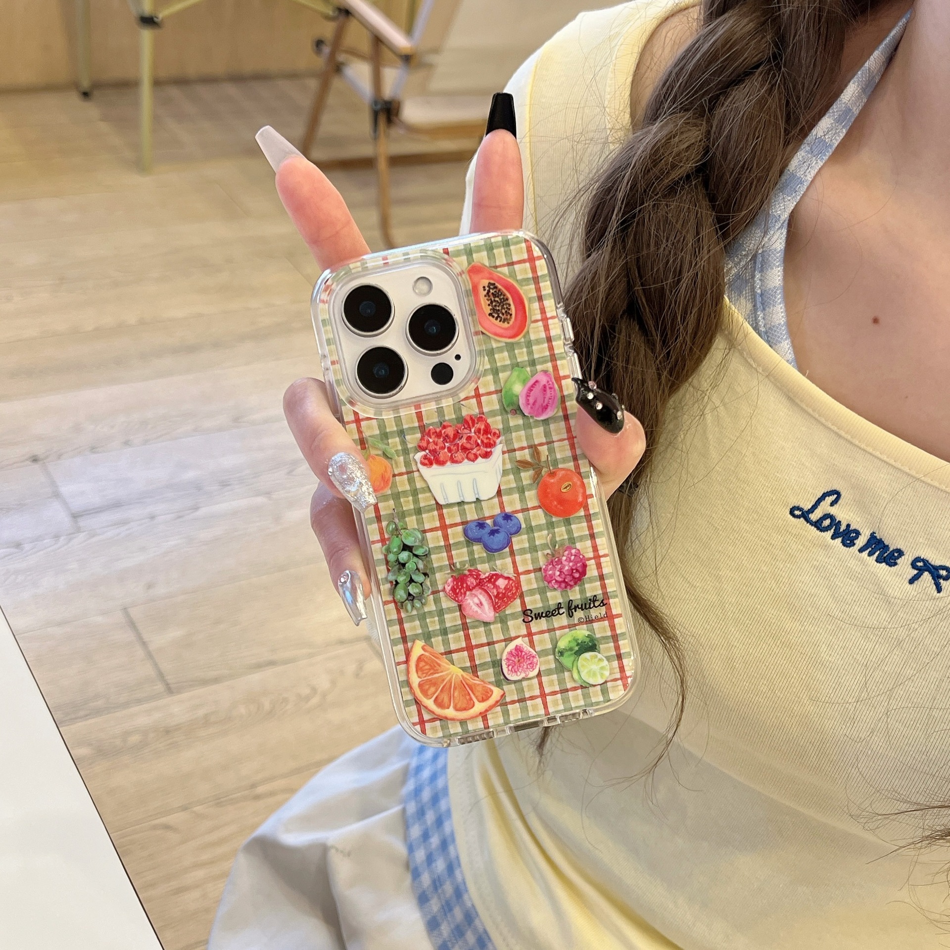 La fruta a cuadros de color de nicho es adecuada para Apple 15/16 funda para teléfono móvil 14Pro colgante 13 verano 16ProMax mujer