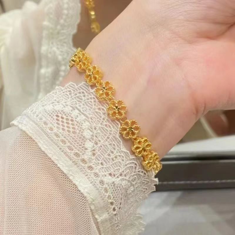 Factory direct supply Zhou's new ing lace hollow peach blossom copper gold-plated bracelet retro good luck wholesale