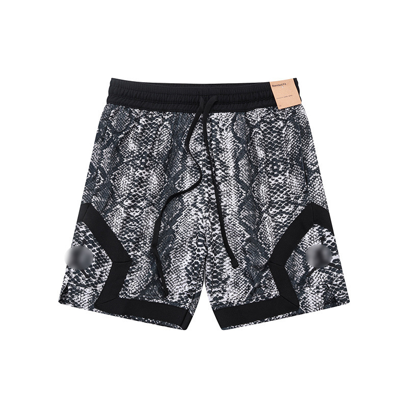 Black and white python-patterned patchwork basketball shorts for men, featuring a drawstring waist, elastic waistband, breathable mesh fabric, and a trendy streetwear casual style Black and white python-patterned patchwork basketball shorts for men, featuring a drawstring waist, elastic waistband, breathable mesh fabric, and a trendy streetwear casual style
