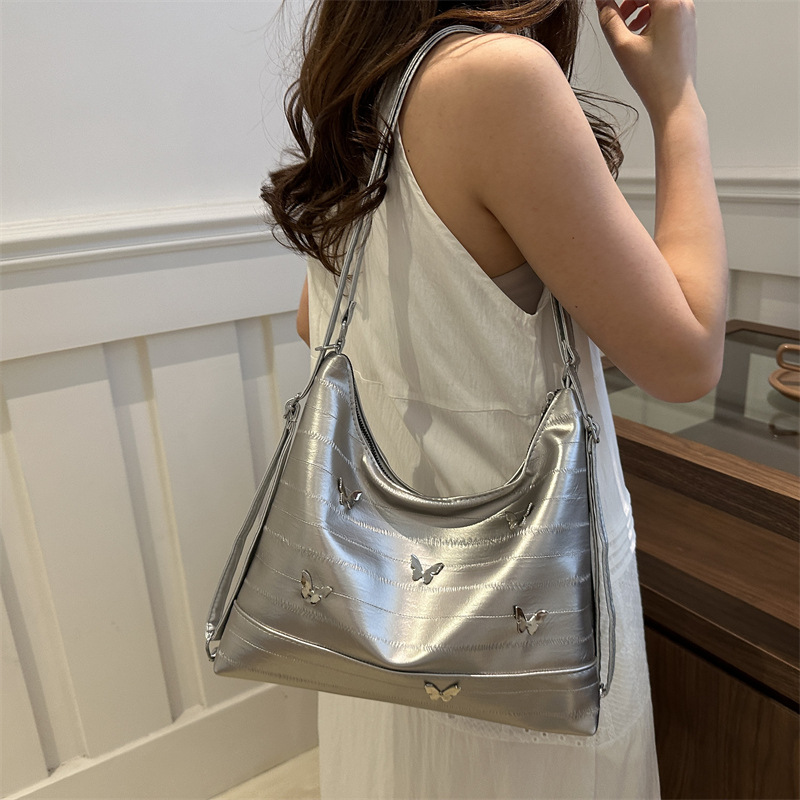 Butterfly decoración de viaje mochila 2024 nueva anguila nicho mochila de hombro de gran capacidad de viaje mochila multiuso