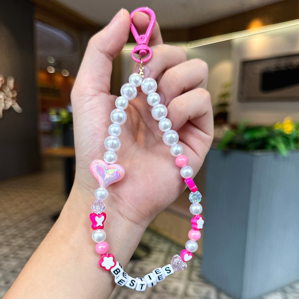 Nuevos productos transfronterizos creativos de letras de color cuerdas trenzadas llavero amor dibujos animados accesorios de diseño bolsos colgantes