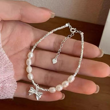 S925纯银碎银子蝴蝶结手链女天然淡水珍珠轻奢小众高级设计感手饰
