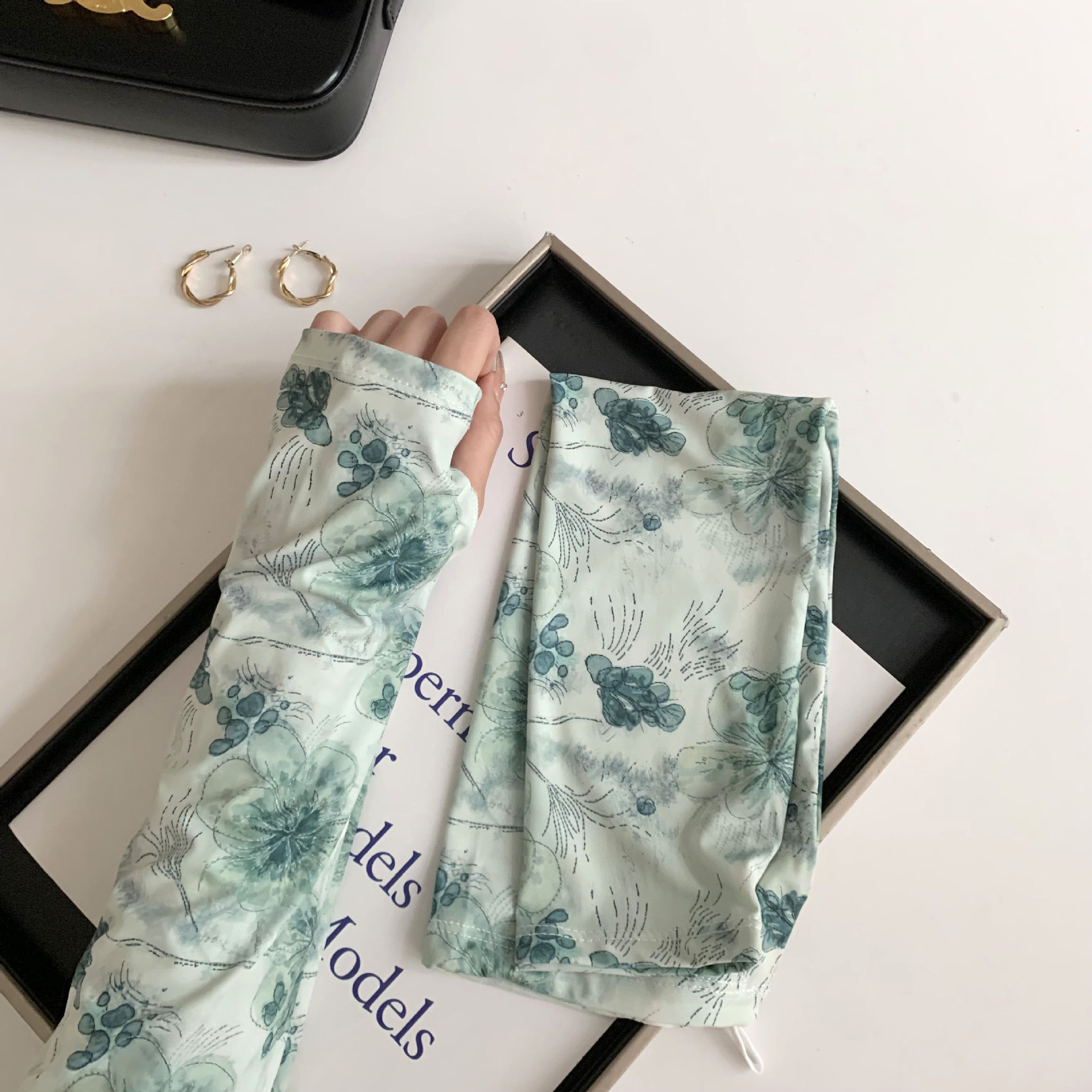 Protector solar manga de hielo manga de seda de hielo nuevo estilo nacional protección UV flor cordón manga de hielo protector de brazo transpirable suelto