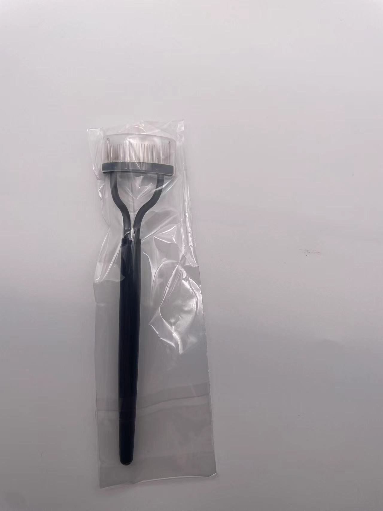 Cepillo de cejas de dientes de acero curvados Cepillo de pestañas de aguja de acero Peine de pestañas Injerto Plantación de pestañas Peinado de pestañas Herramientas de belleza Transfronterizo