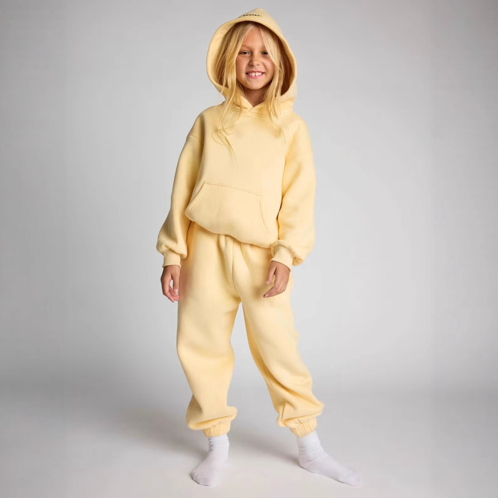 Abbigliamento da stazione indipendente, set di due pezzi con pantaloni lunghi con cappuccio per bambini Dopamine 2025, europei e americani_voghion.com