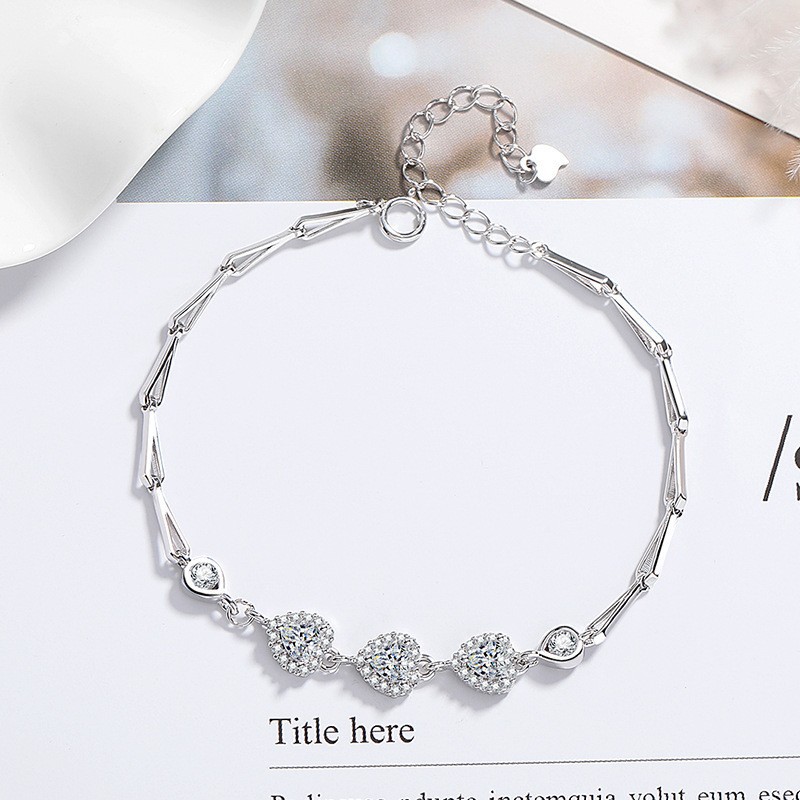 Pulsera pequeña en forma de corazón con cola de pez SL-67
