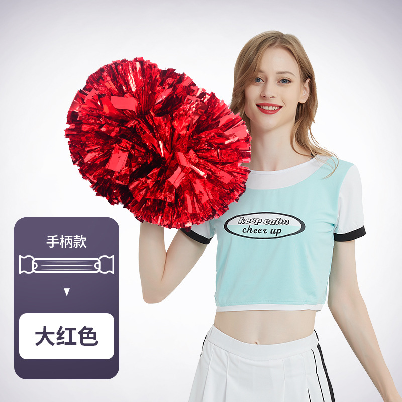 Flor bola de la flor porristas bola de la flor de la mano que sostiene la flor juegos de deportes mano que sostiene apoyos alegría apoyos en stock