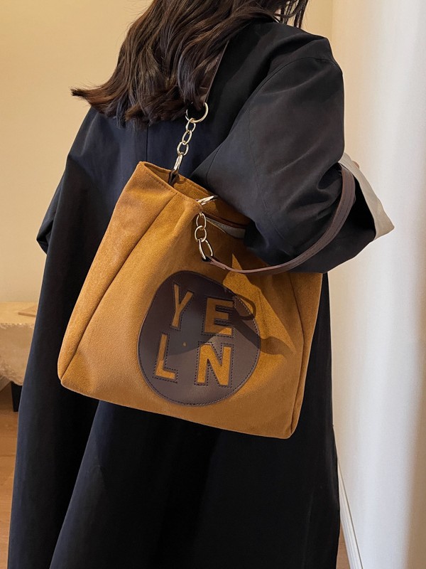 Bolso de gran capacidad para mujeres 2024 nuevo otoño y invierno de moda letras de colisión de color bolso de hombro universal bolso de clase