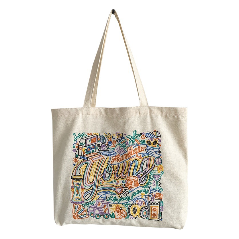 Nuevo bolso de lona bordado para mujer, un solo hombro, estudiante universitario, bolso de lona para clase, bolso de compras literario japonés y coreano.