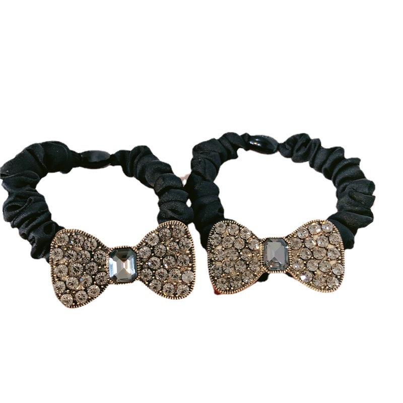 Corea del Sur Dongdaemun moda retro arco cristal diamante lleno banda de pelo cuerda de pelo francés intestino grueso anillo cabeza cuerda banda de goma