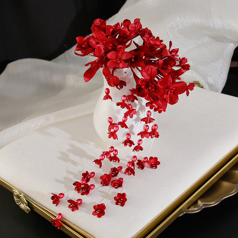 Red hair accessory, orchid