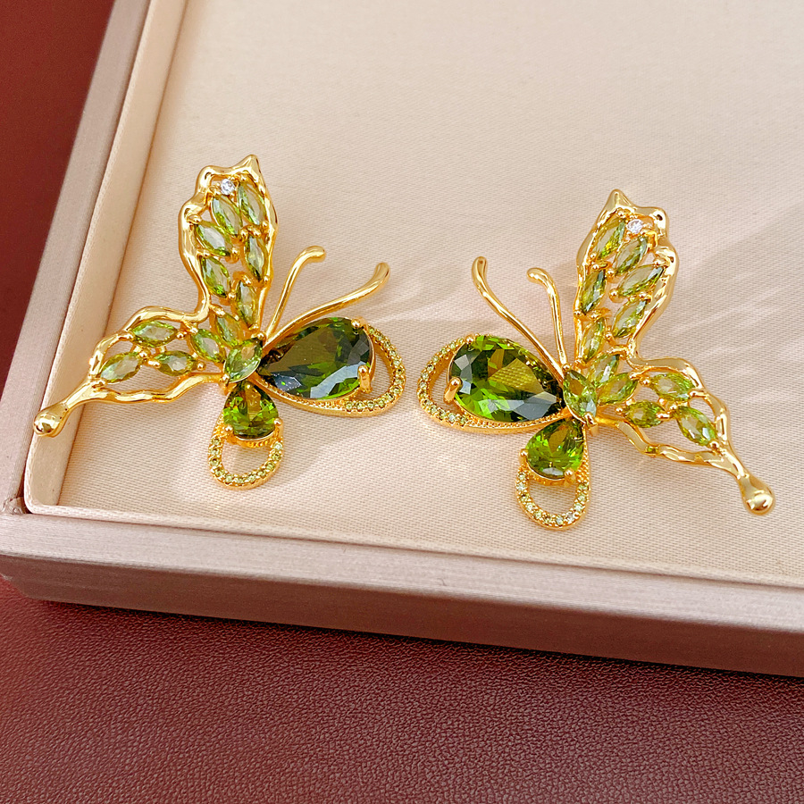 Oro verdadero electron-combustible mariposa de piedra pernos de orejas temperamento exquisito personalidad nicho pendientes ligero lujo conjunto de joyas de alta calidad