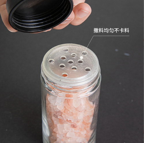Set of revolving skyscraper glass condiment rack, condiment bottles, spice jars, seasoning bottles