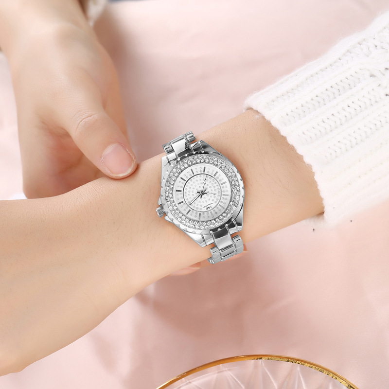 Nuevo reloj estudiante temperamento simple moda de negocios femeninos Reloj de cuarzo cinturón de acero estrellado incrustado con diamantes