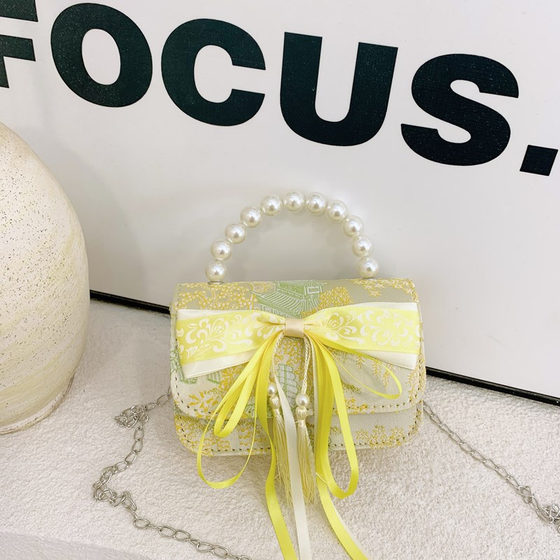 Bolsas de niños nuevas bolsas de mano de perlas de estilo nacional, bolsas de cadena de arco de bordilla princesa, bolsas de hombro de moda nacional de niñas lotes