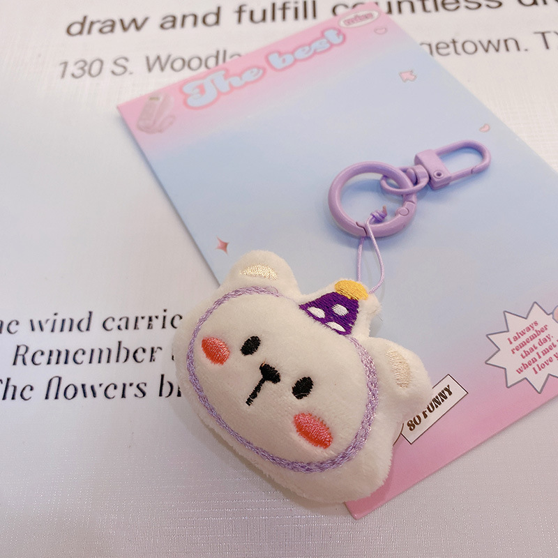 HD843A025 tela de otoño púrpura relleno de algodón muñeca llavero colgante bolso colgante de teléfono móvil