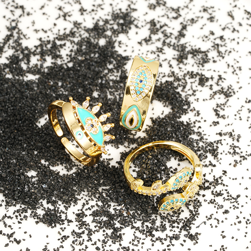 Nuevos productos transfronterizos de oro de arena de 18 quilates de ojos de diablo anillo de anillo de nicho femenino simple joyas de estilo europeo y americano al por mayor