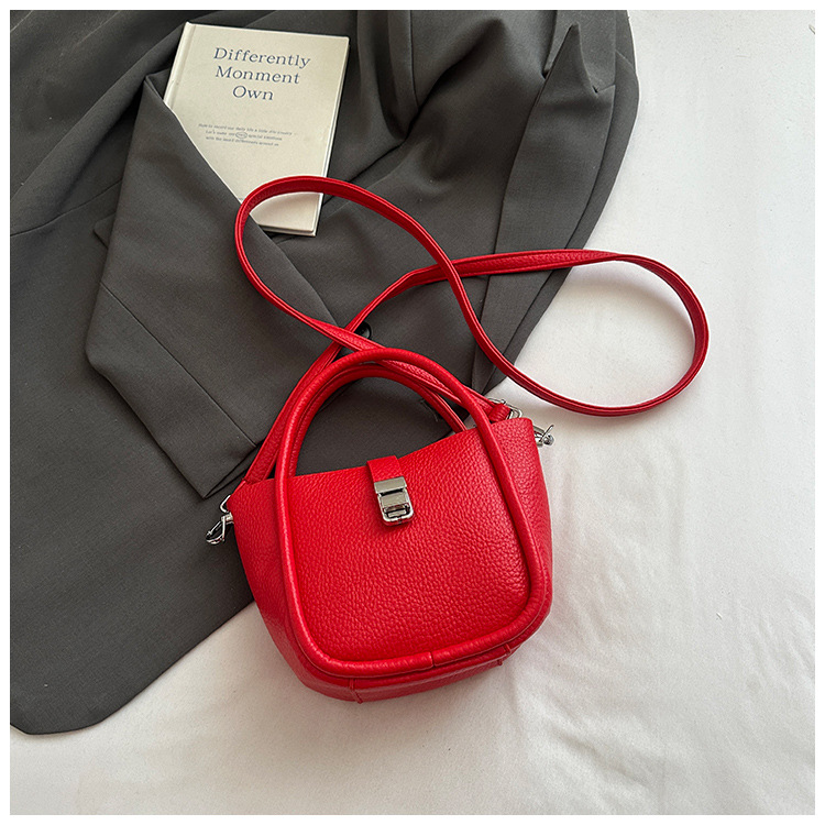 Bolso de cubo para mujer, tendencia transfronteriza de alta gama, bolso de mano con patrón de lichi, viaje diario, bolsa de mensajero de canasta de verduras de estilo occidental