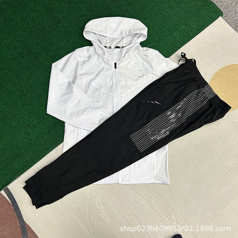 2025 nuevo conjunto de otoño y invierno pantalones de seda de secado rápido chaqueta deportiva con cremallera con capuchón protector solar para hombres y mujeres