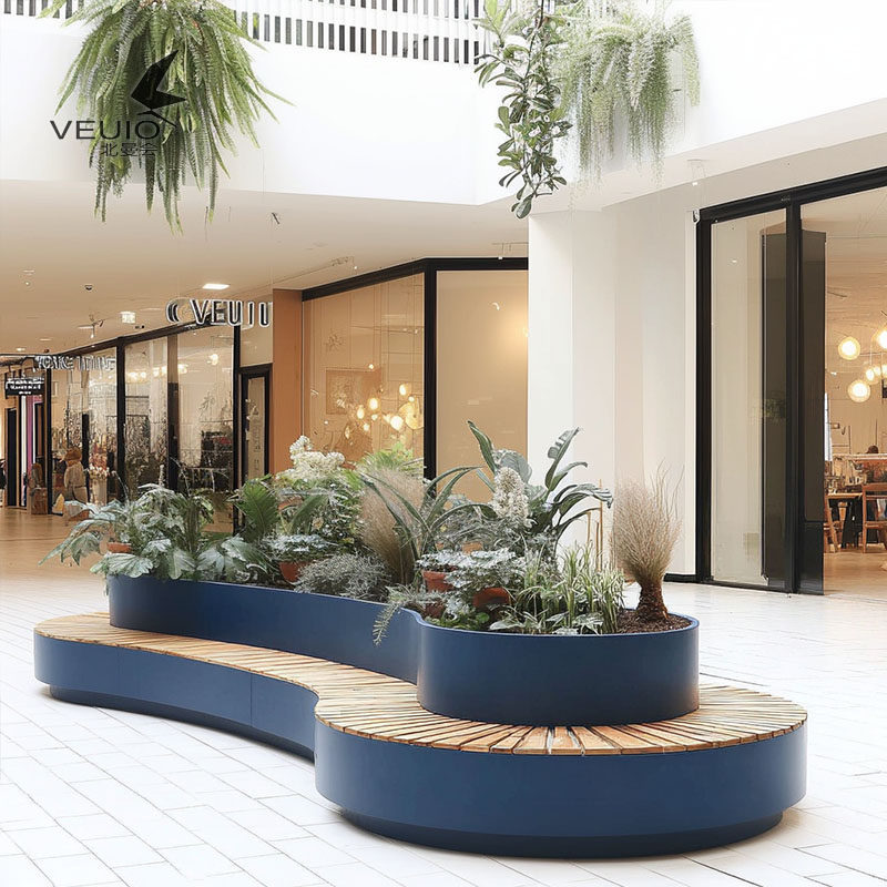 Curved wrought iron flower box and seating unit, integrated design for shopping mall lobbies, metal flower planter, commercial plaza planting box
