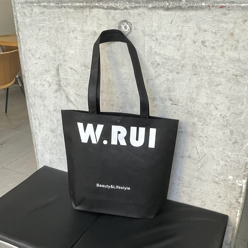 Bolsa de tela no tejida negra para imprimir logotipo de moda de la tienda de ropa de mujer bolsa de publicidad de compras