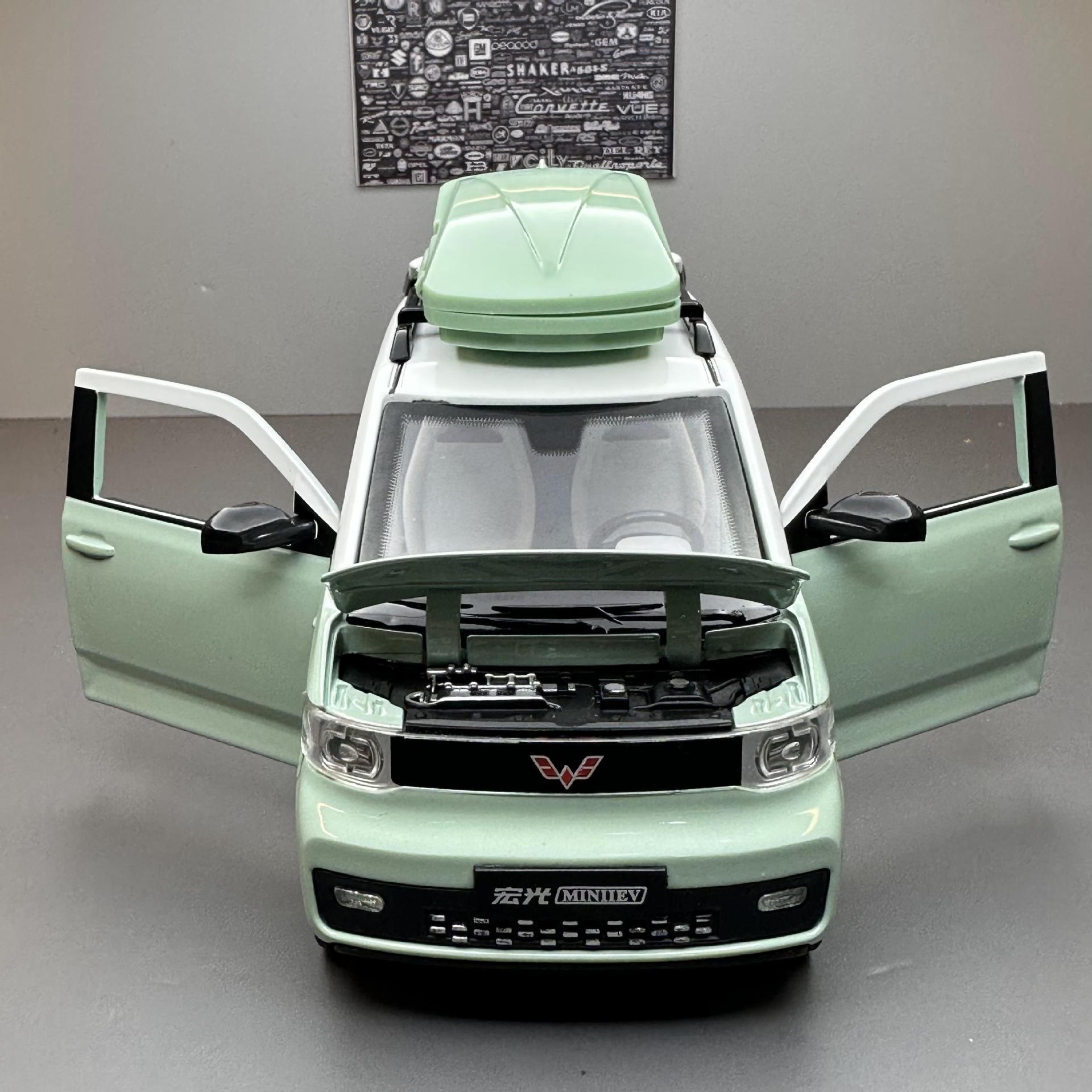 Modelo de coche de aleación de coche 1:24 Wuling Hongguang miniev Tire hacia atrás el sonido y la luz de cuatro puertas niño modelo de juguete adornos