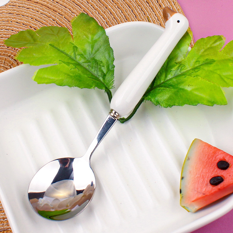 Svanformad sked i rostfritt stål med keramiskt handtag_voghion.com