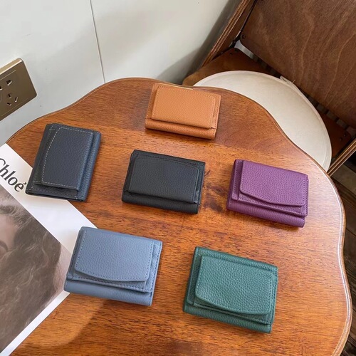 Cross-border first-layer cowhide new women's wallet short Rfid genuine leather wallet coin bag buckle card holder wholesale